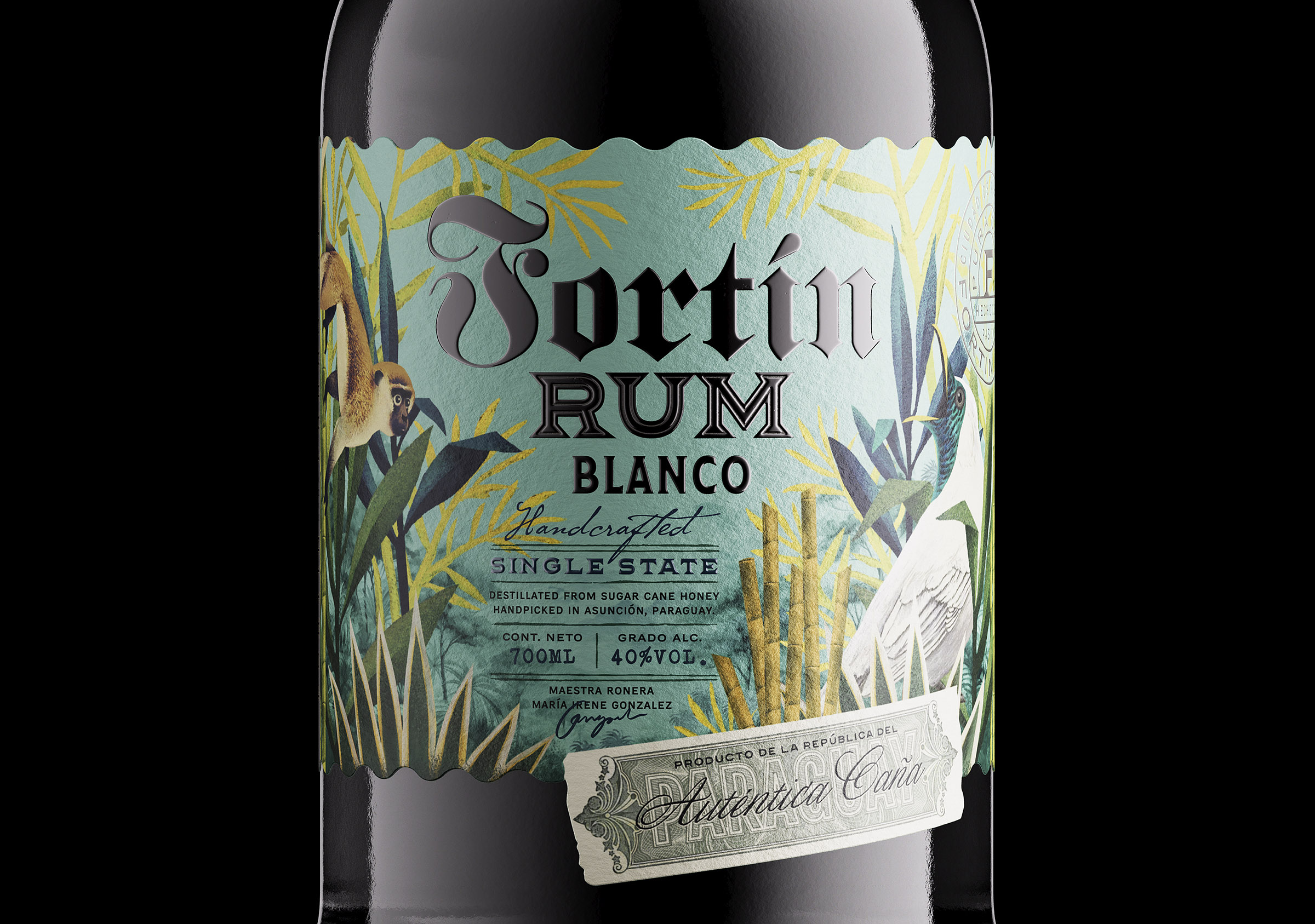 Premium Fortín Blanco rum bottle with tropical botanical label design and handcrafted spirits branding.